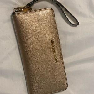Gold Michael Kors wallet/ wristlet